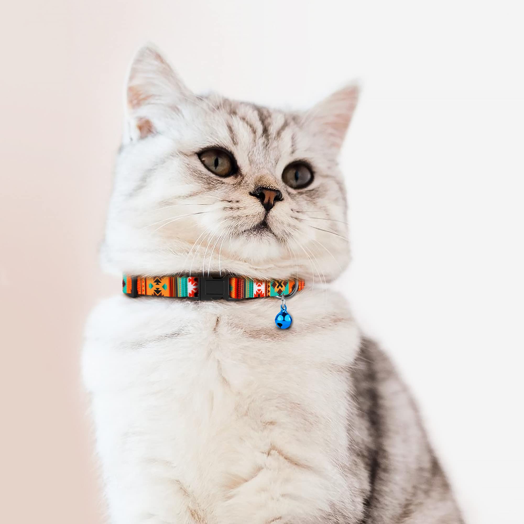 Budkas cat collars breakaway buckle close-up focusing on reliable safety release during curiosity