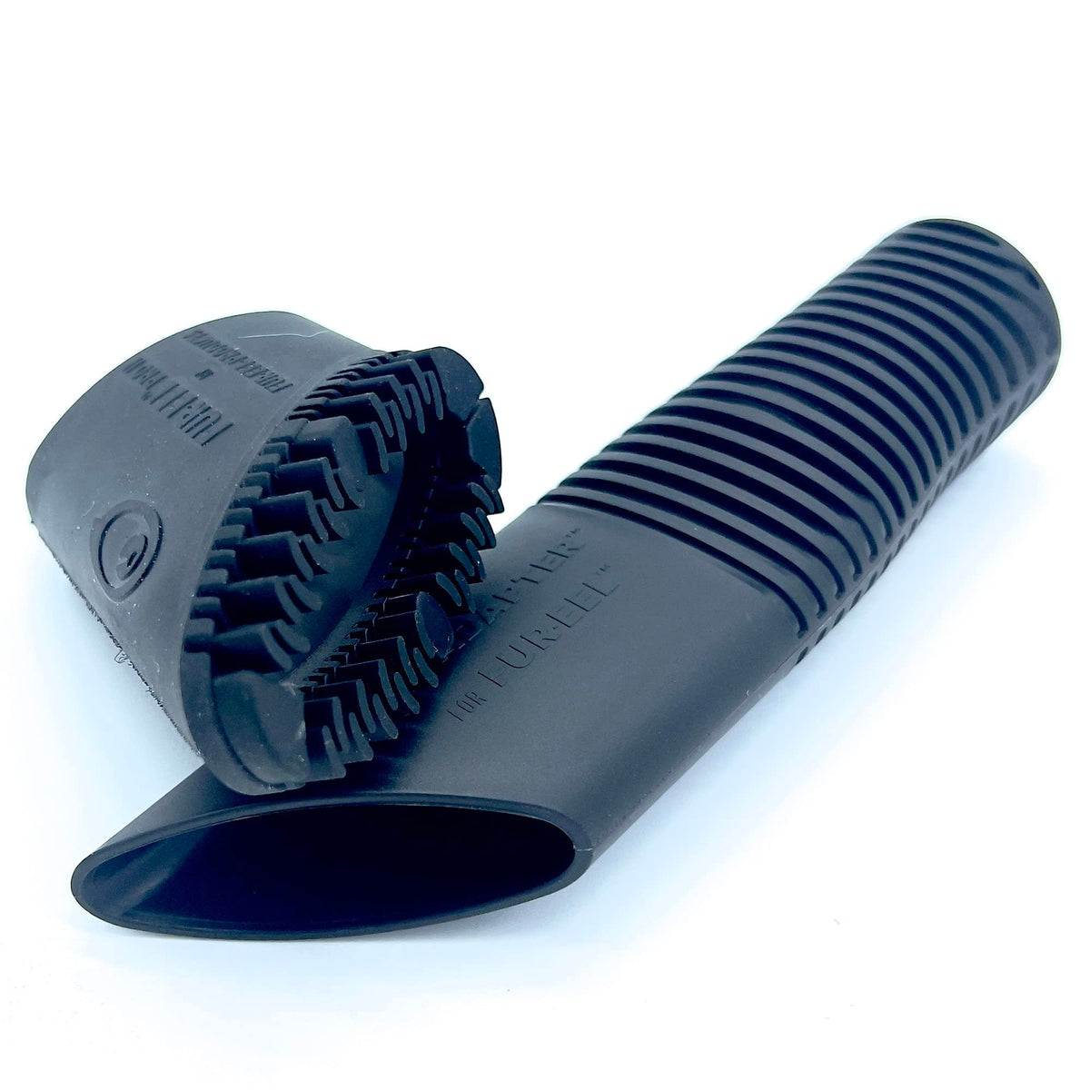 Buff Brite Fur Remover Pro II with Fang Adapter attached to vacuum for fast pet hair pickup.