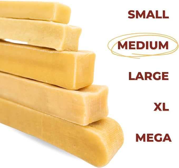 Bully Bunches Yak Chew in hand shows portable grain-free snack option.