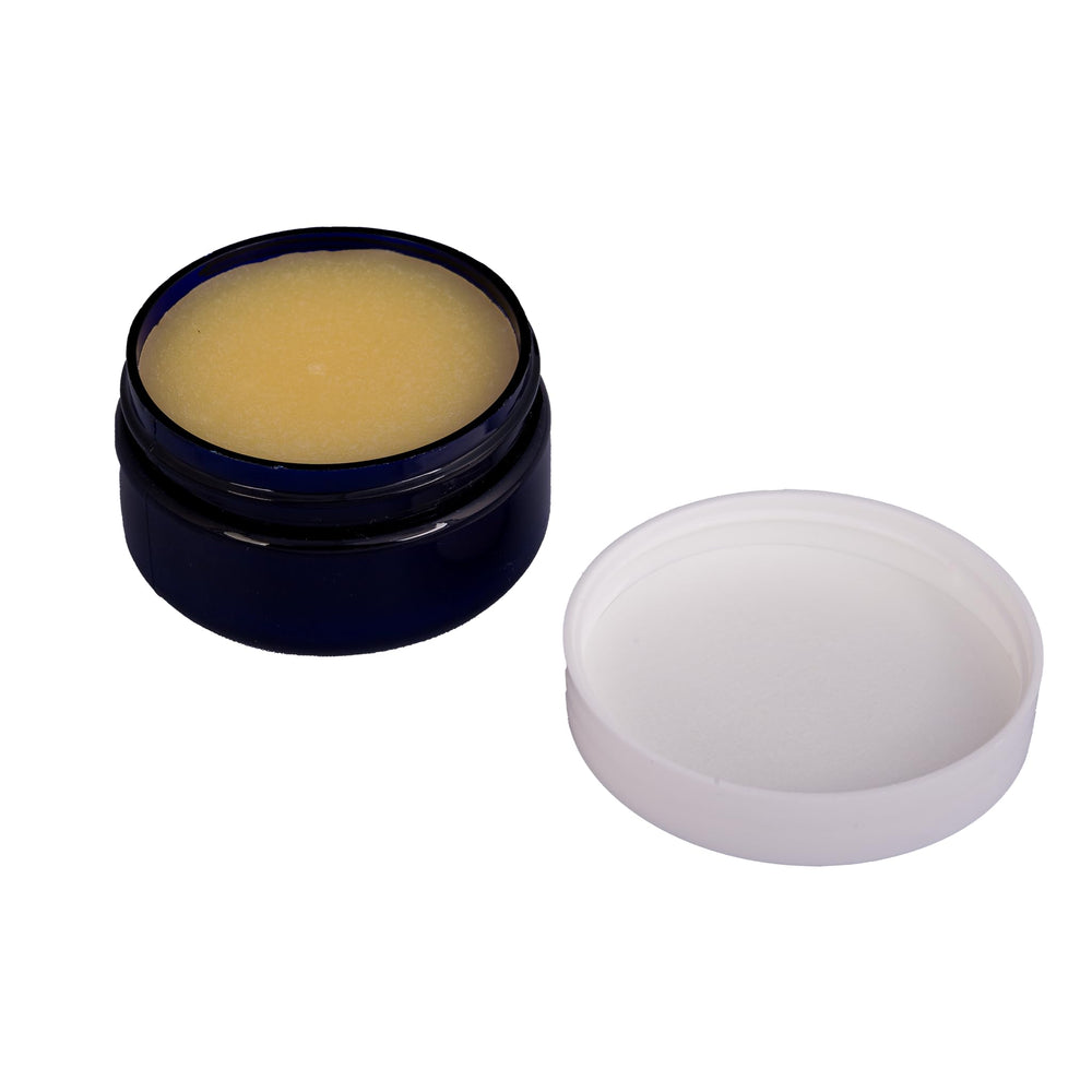 Close-up of Bully Balm texture showing creamy consistency.