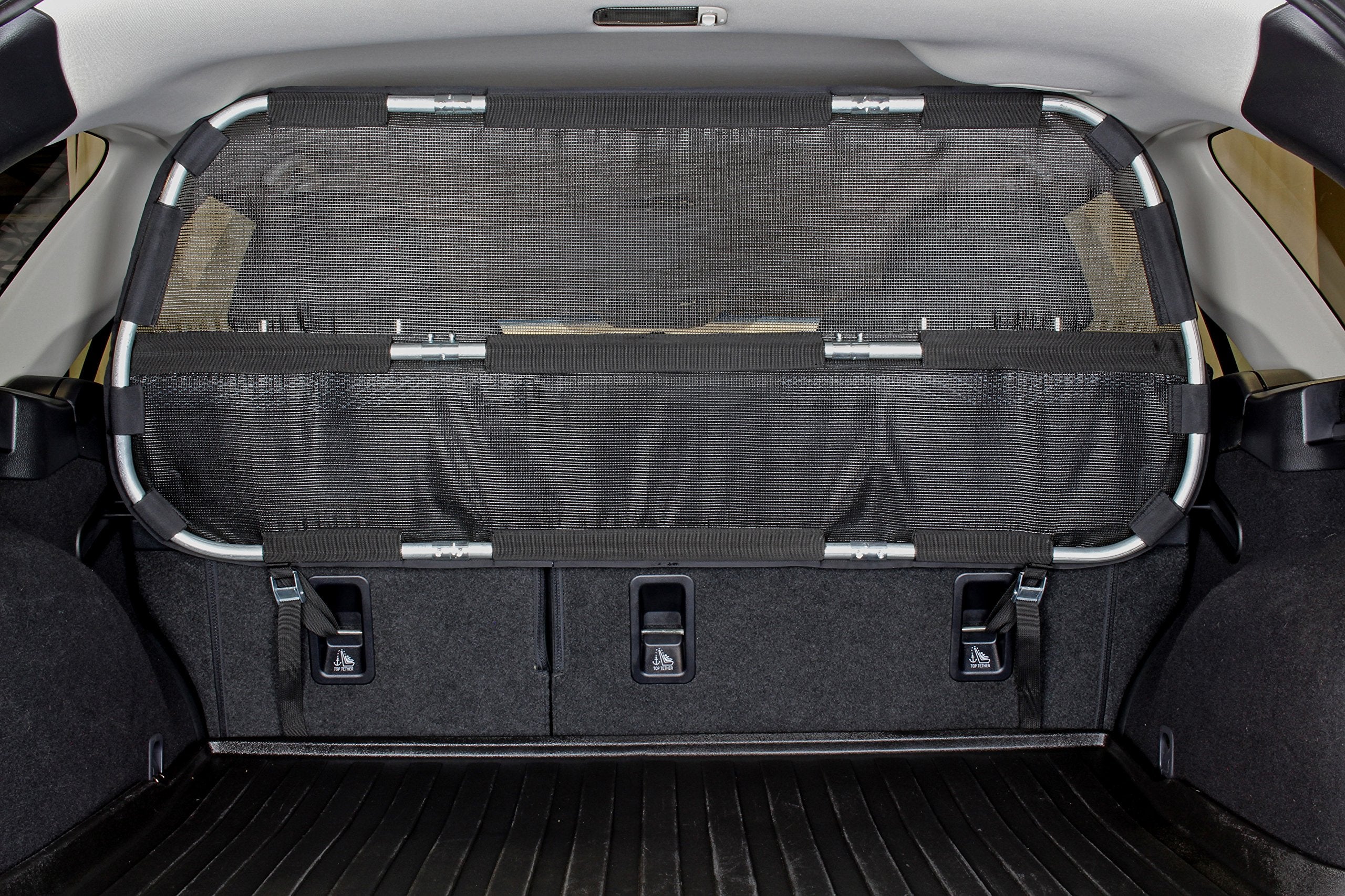 Bushwhacker cargo barrier assembly view demonstrates quick, tool-free installation for safer trips.