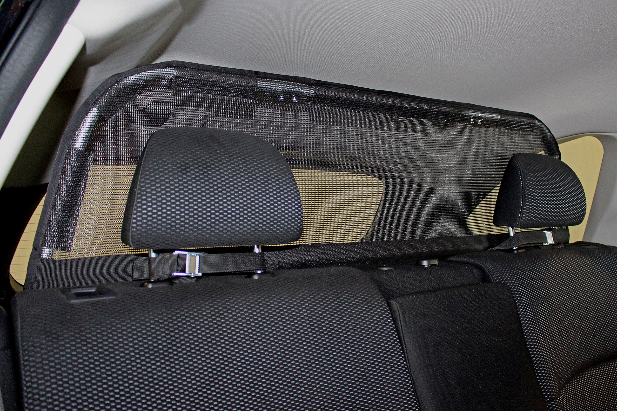 Bushwhacker cargo barrier detailed-dimension view emphasizes 46x21 inch fit.