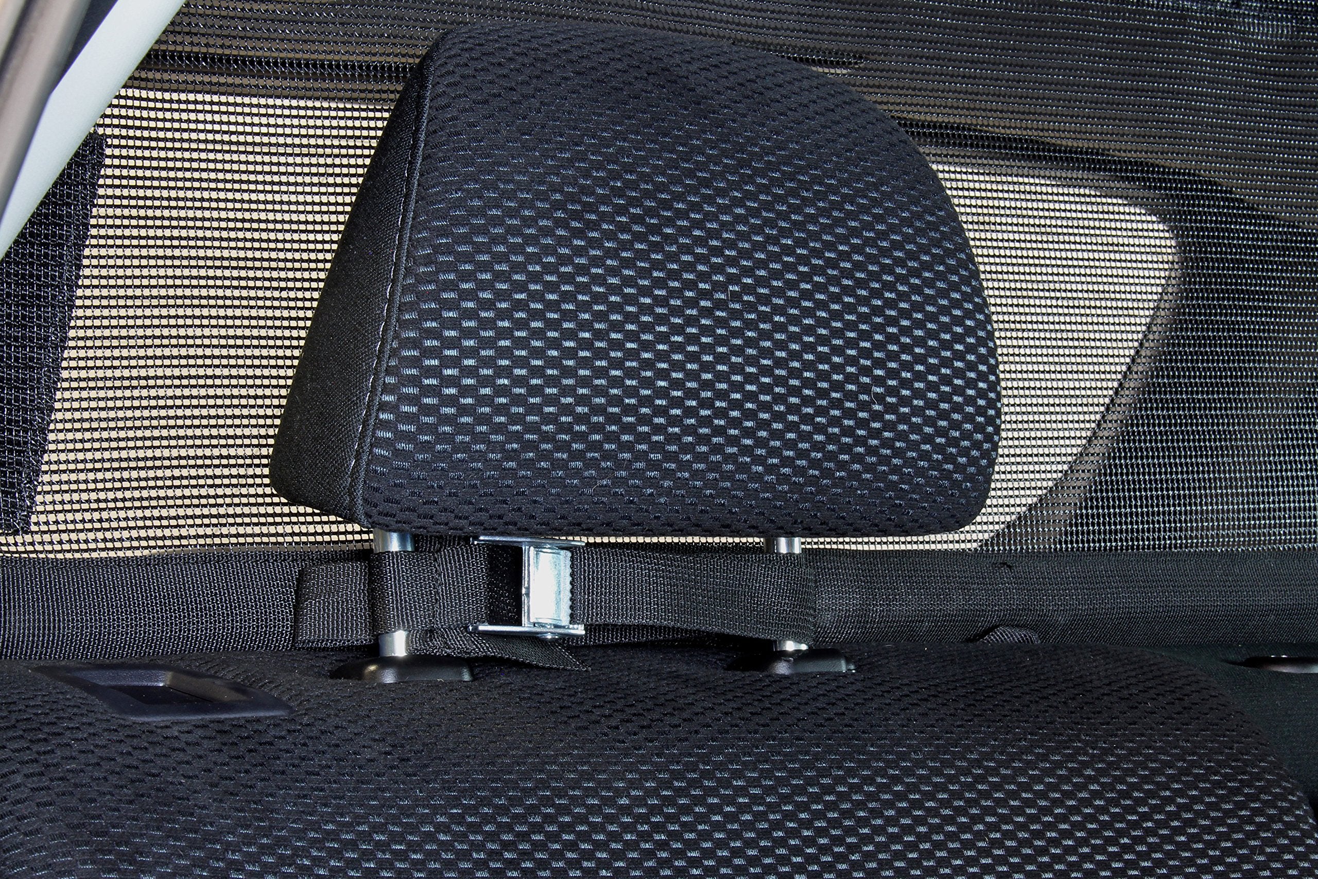 Bushwhacker cargo barrier installation in a hatchback shows headrest attachment for quick, secure setup.