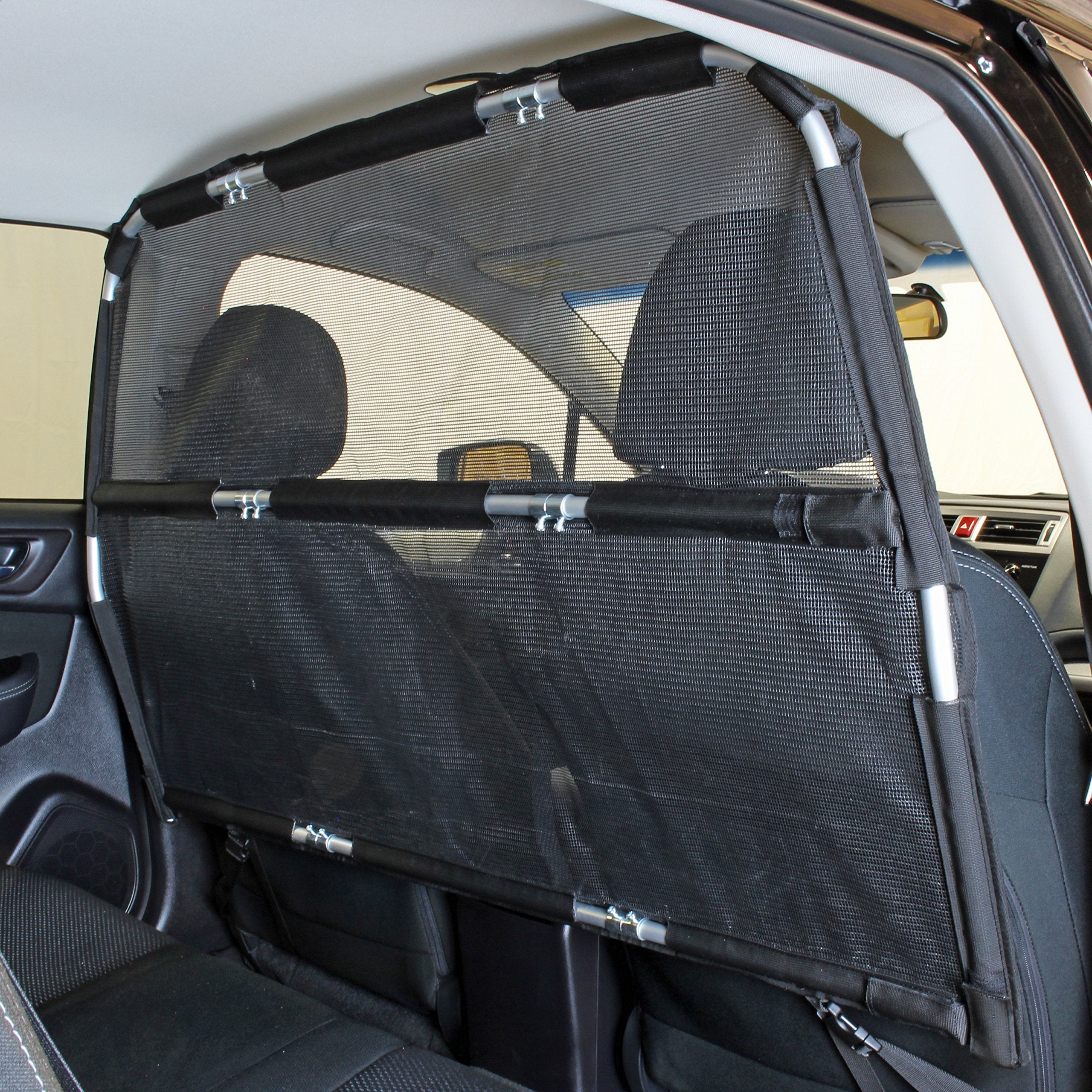 Bushwhacker Deluxe dog barrier front view showing secure backseat safety