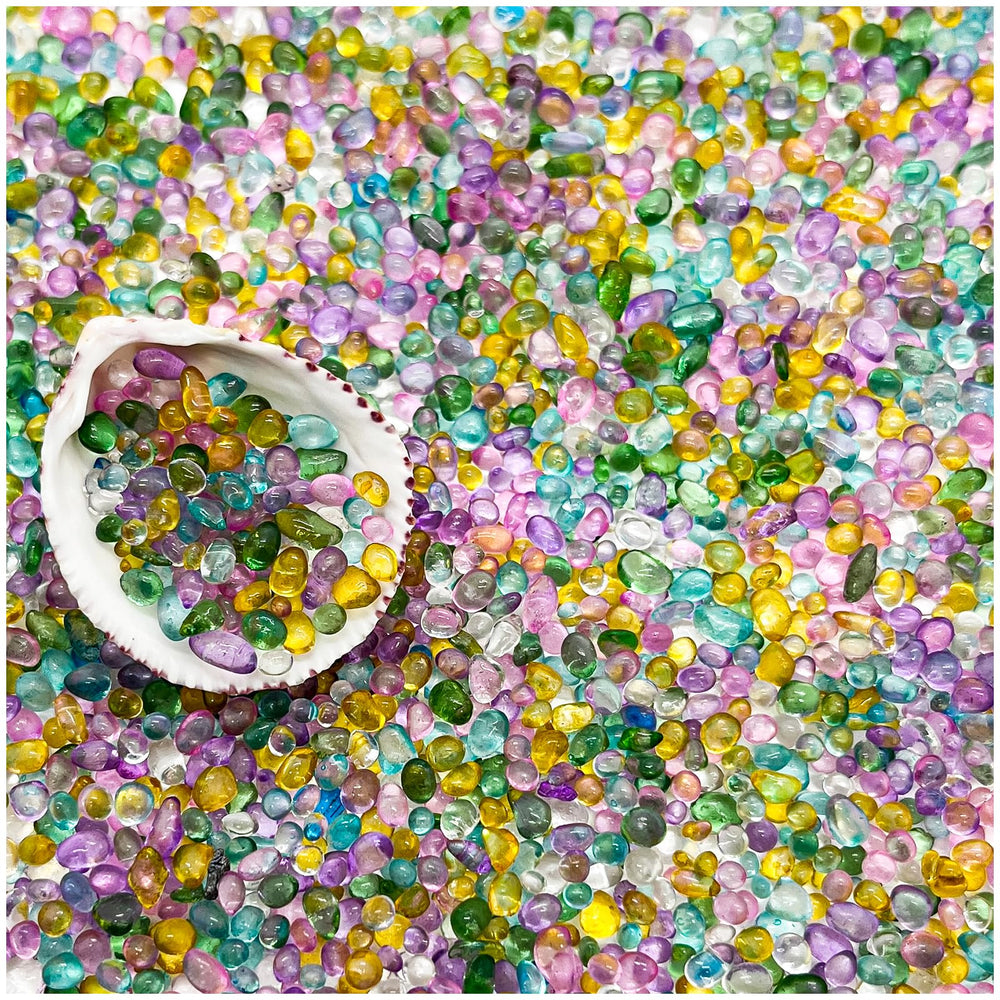 BXI blue glass gravel for aquarium tank adds color and visual depth.
