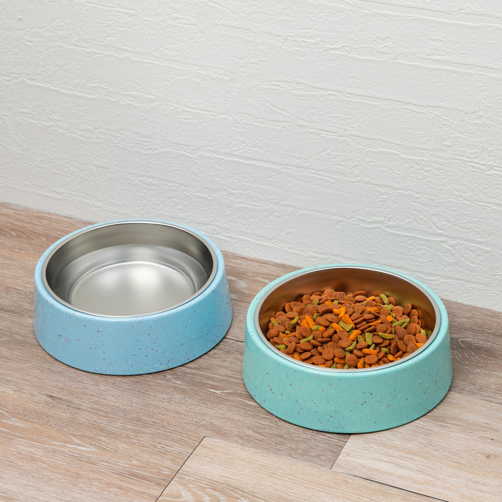 The bzyoo elevated-height blue bowl supports easy pet reach.