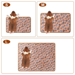 CADONO paw-print pink blanket provides lightweight warmth for lounging and travel.