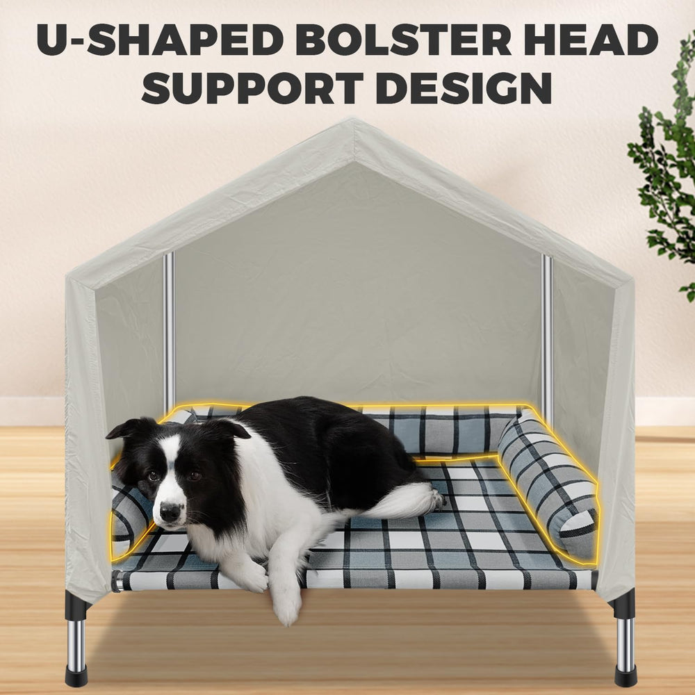 Caghash Elevated Dog Bed House canopy image highlights shade and wind protection outdoors.
