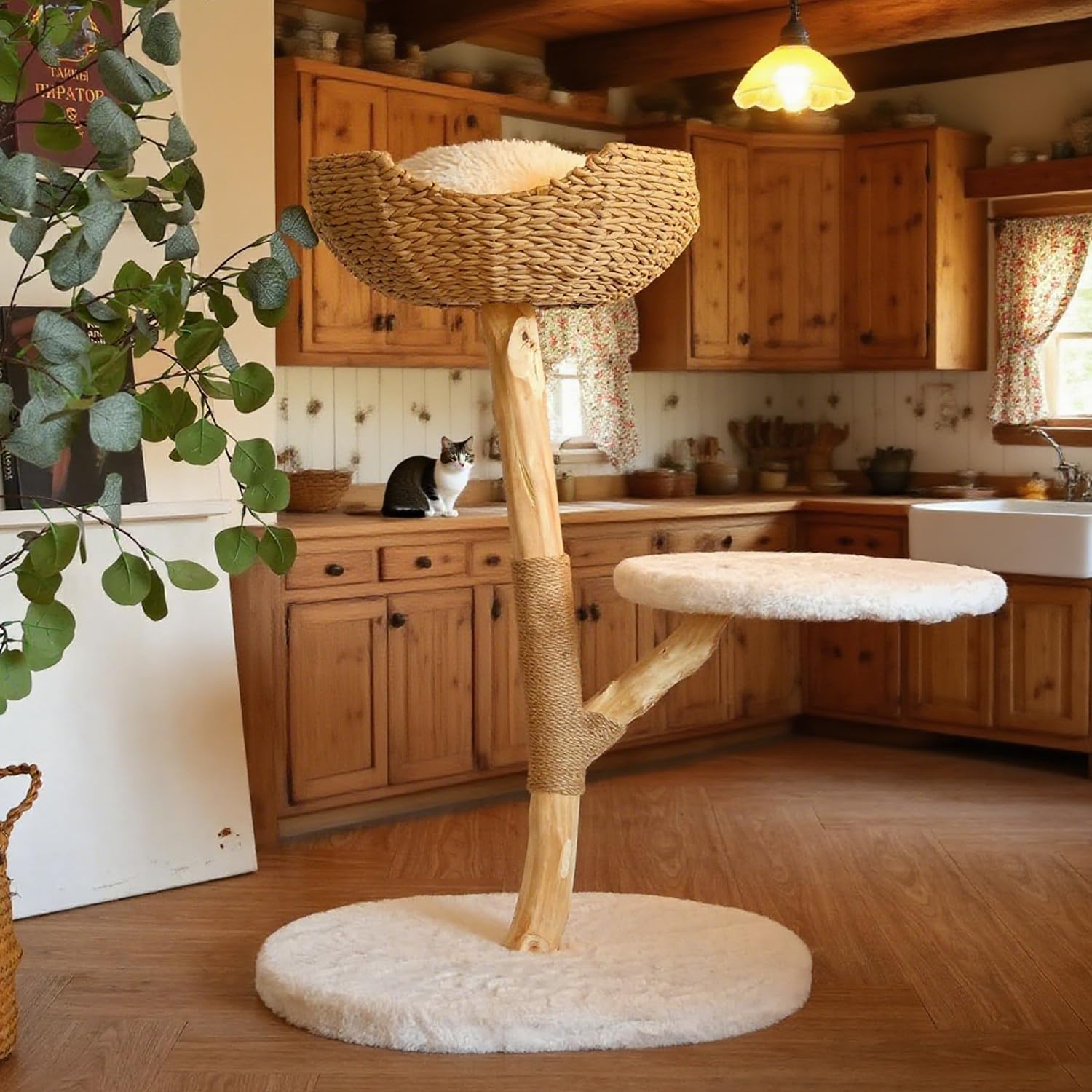 CAMTTIR cat tree has hanging toy ball to spark play.
