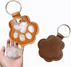 cat-dog pet hair keychain paw design detail, symbolizing the bond