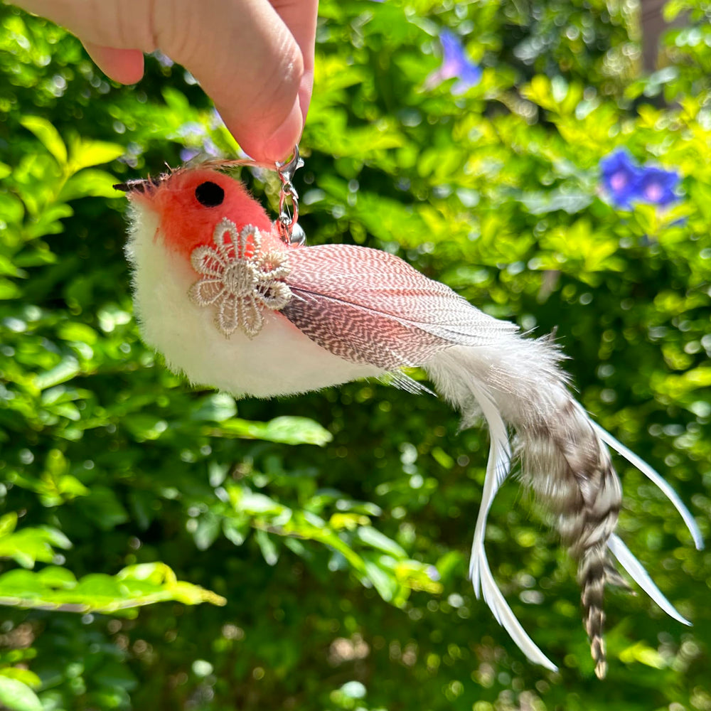 CATENEED wand toy setup with feather attachments in action