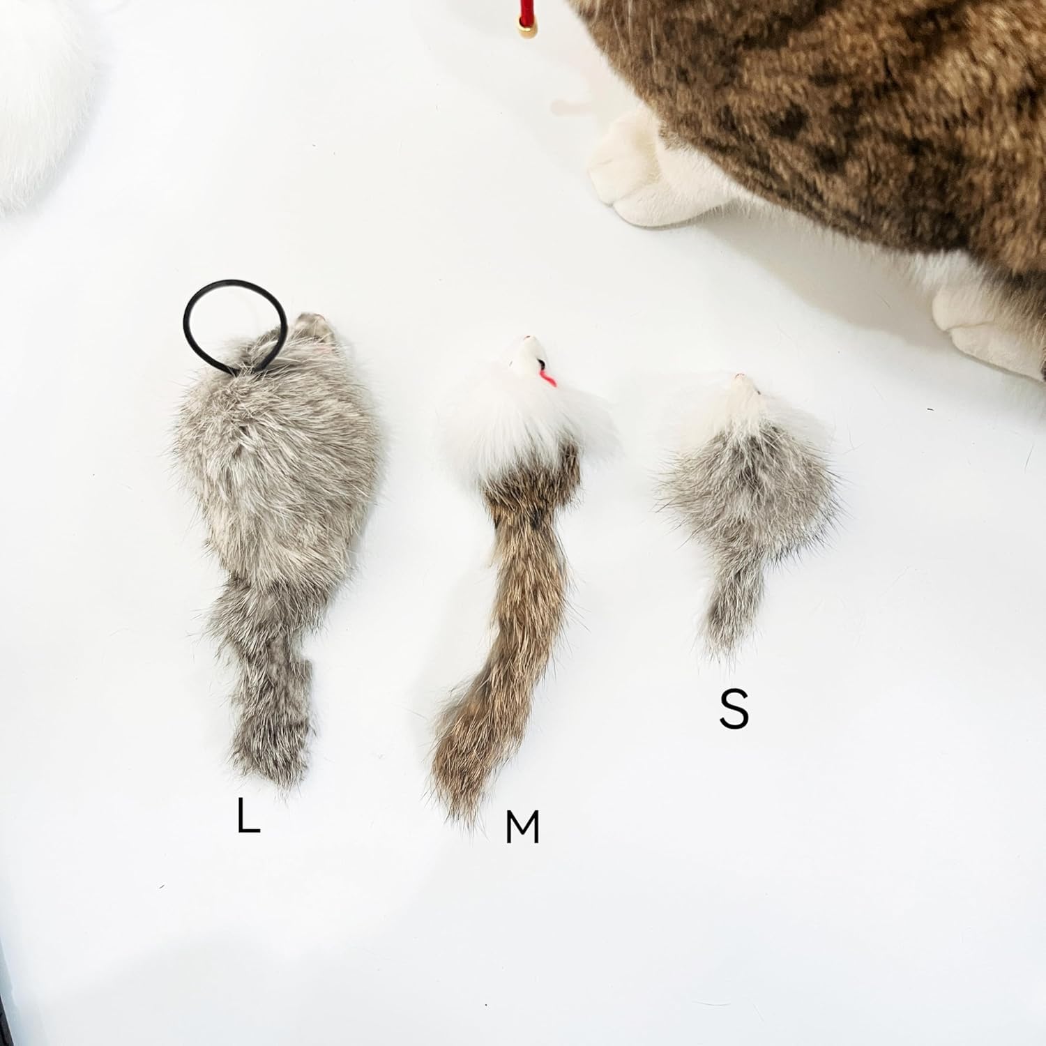Caticalife Real Rabbit Fur Mouse Toy in action showing chase and fetch