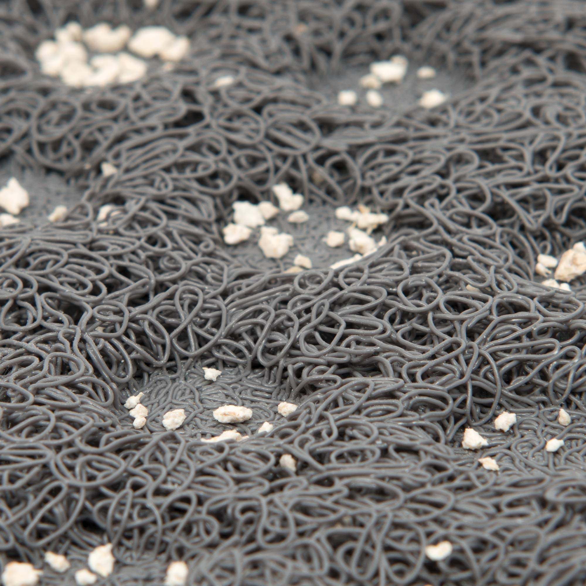 Catit Litter Mat in front of litter box area minimizes mess