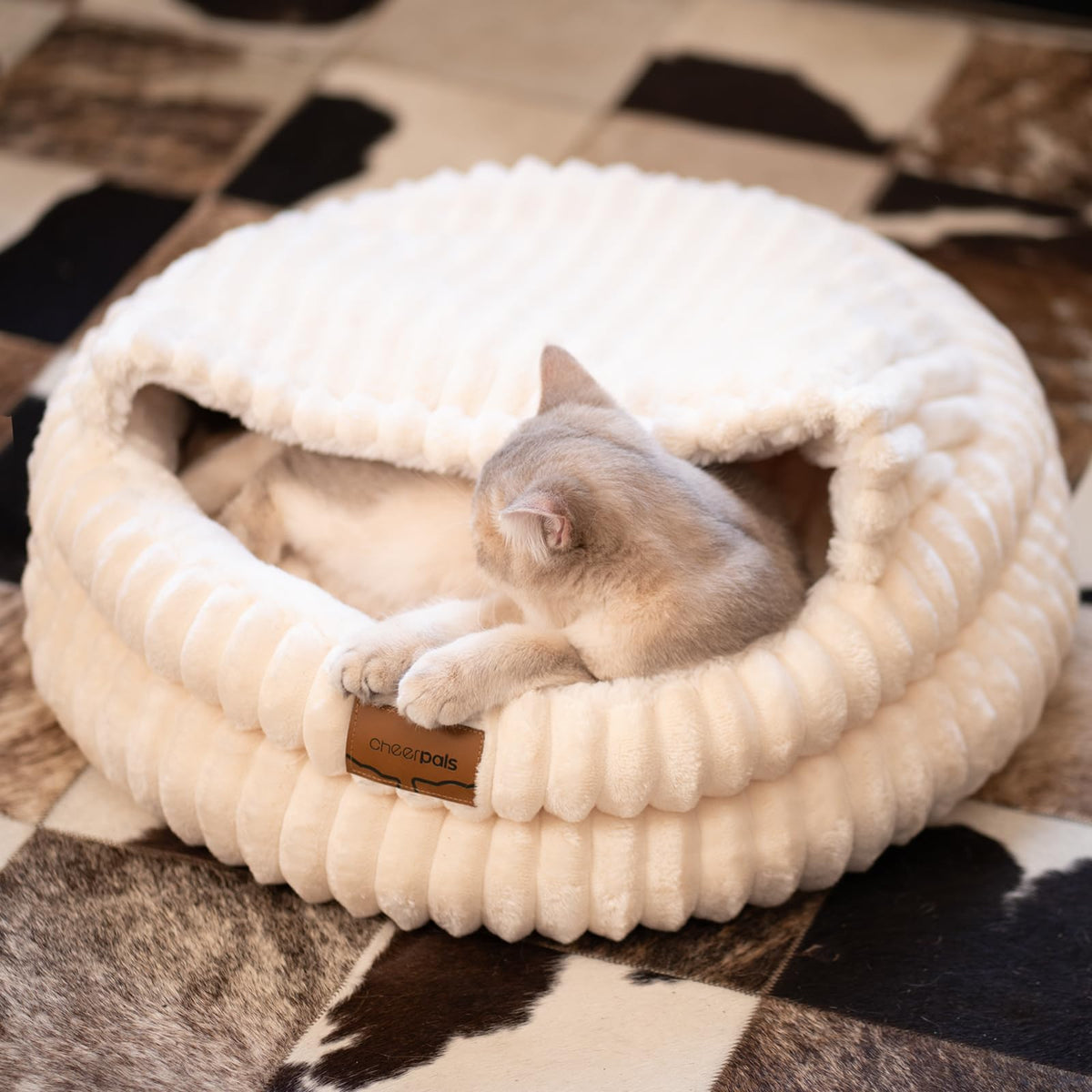 CHEERPALS cat bed round soft fluffy white—cozy refuge for indoor cats.