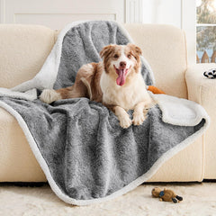 ChiXnuggle dog blanket waterproof on couch protects furniture from spills.