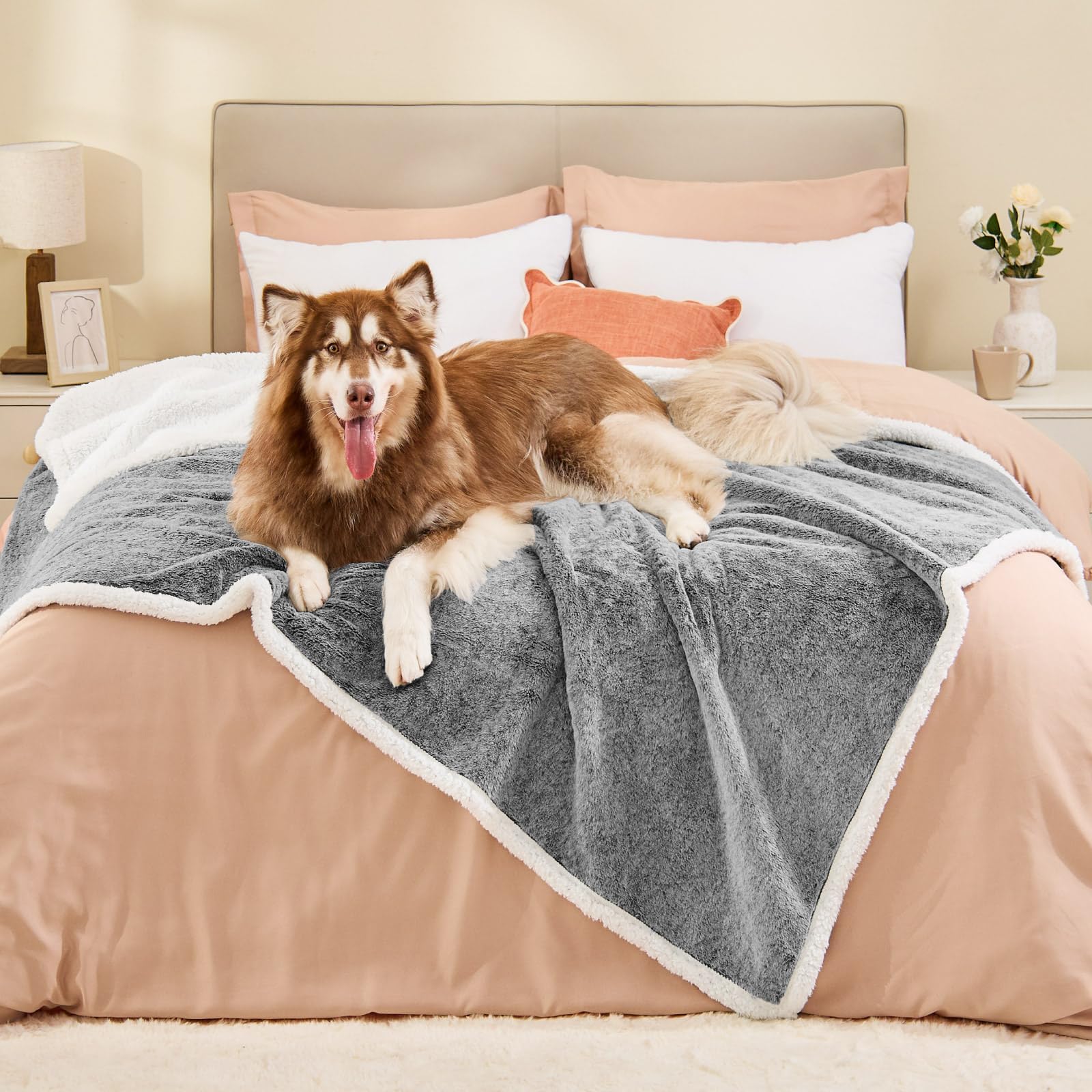 ChiXnuggle waterproof faux fur front blanket shields furniture from spills and pet hair.
