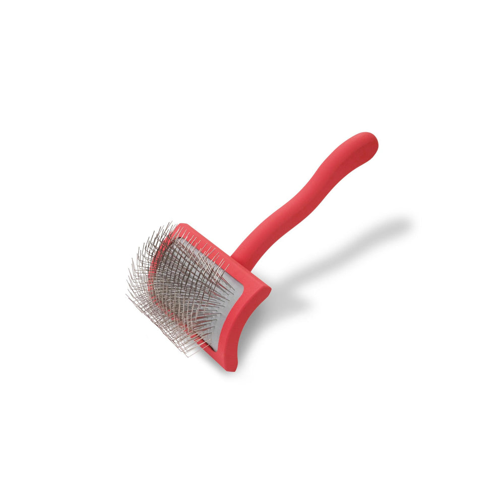 Chris Christensen Big G Slicker Brush deshedding action targets undercoat for double-coated breeds.