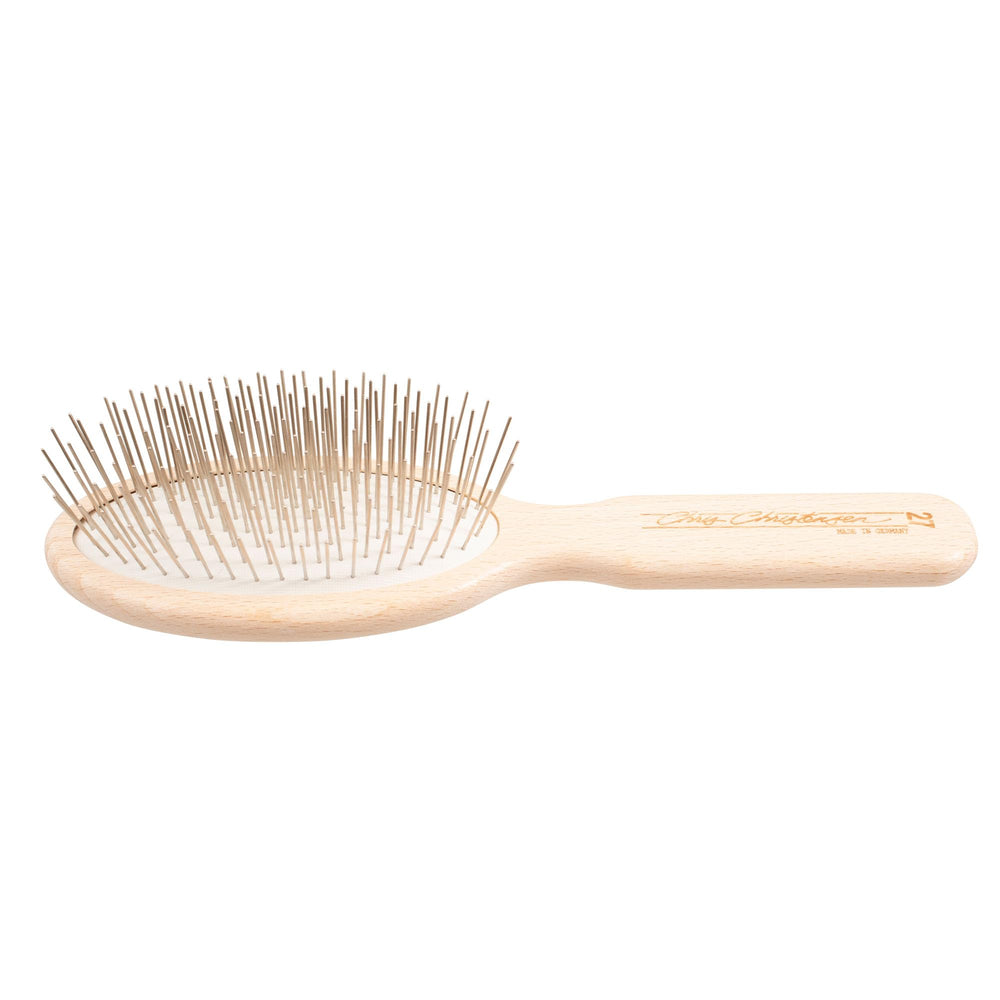 Chris Christensen dog brush 27mm oval packaging with warranty information.