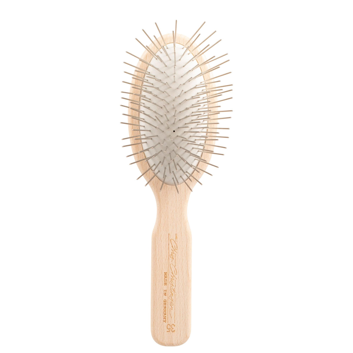 Chris Christensen 35mm oval pin brush glides smoothly through thick coats.