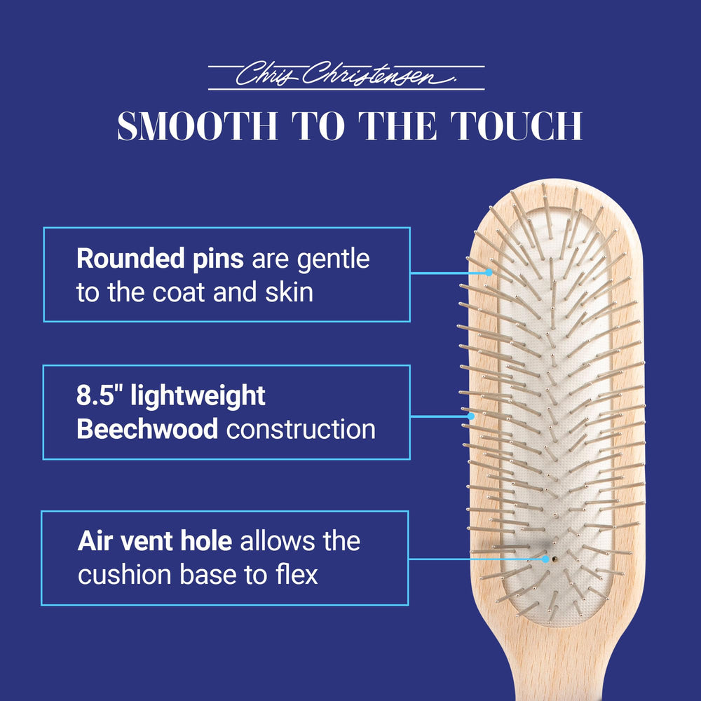Chris Christensen oblong brush cushion and pins promote even coat flow across the body.