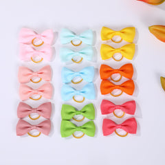 Clipband handmade grosgrain bows showcase bright colors.