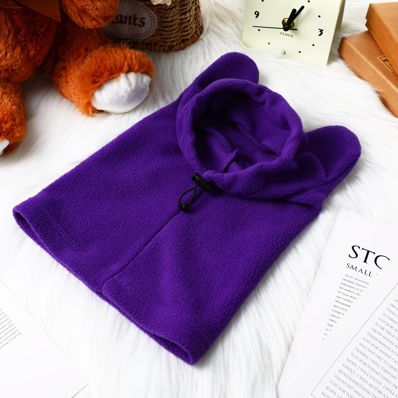 Clysee dog hood scarf combo delivers neck warmth and head coverage during chilly walks.