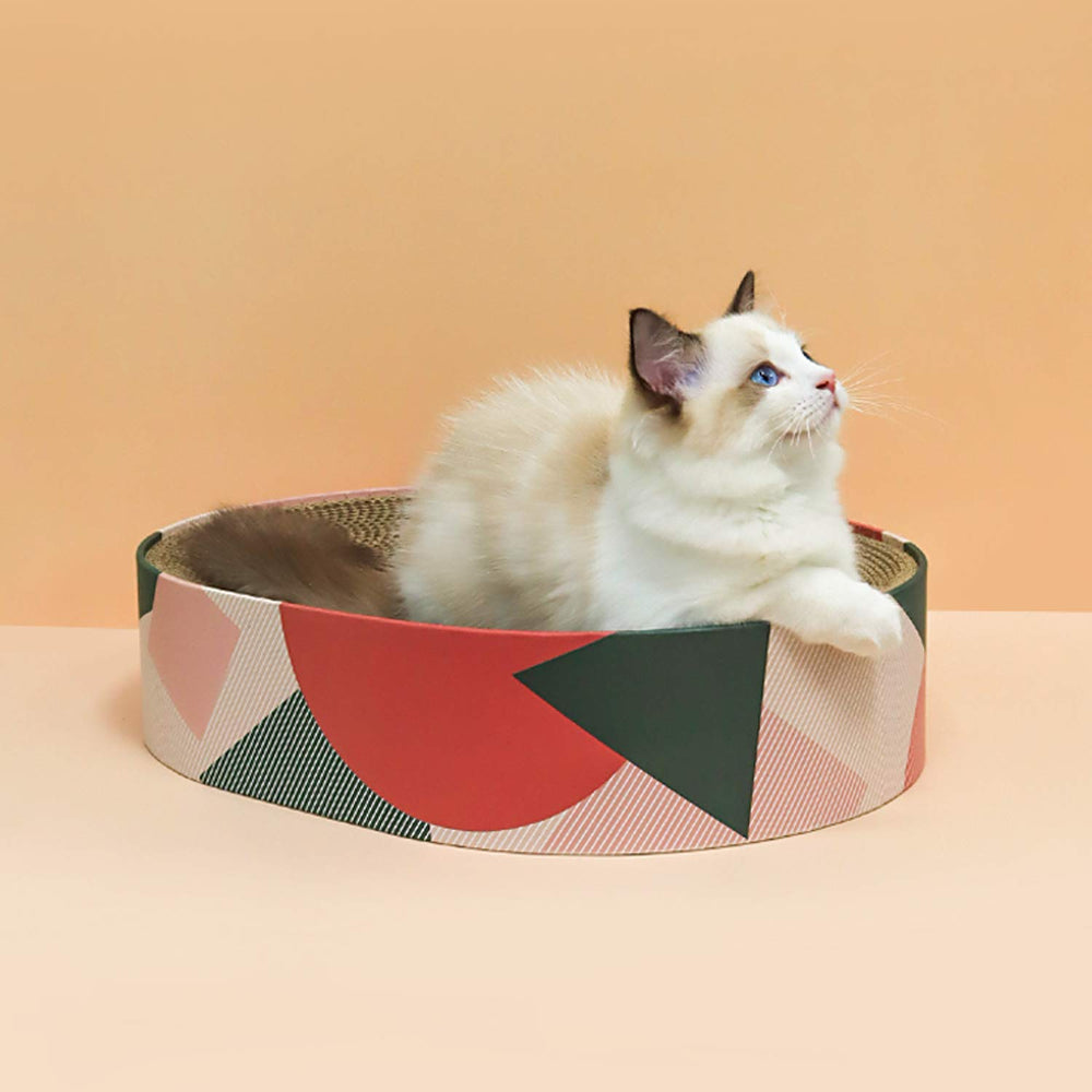 ComSaf cat nap relaxation oval bed offers a cozy resting space.