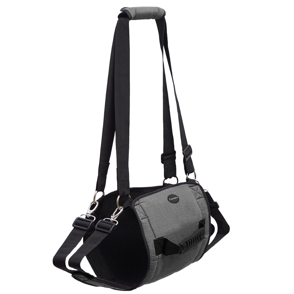 Coodeo dog carry sling side-worn demonstrates full-body support during transfers
