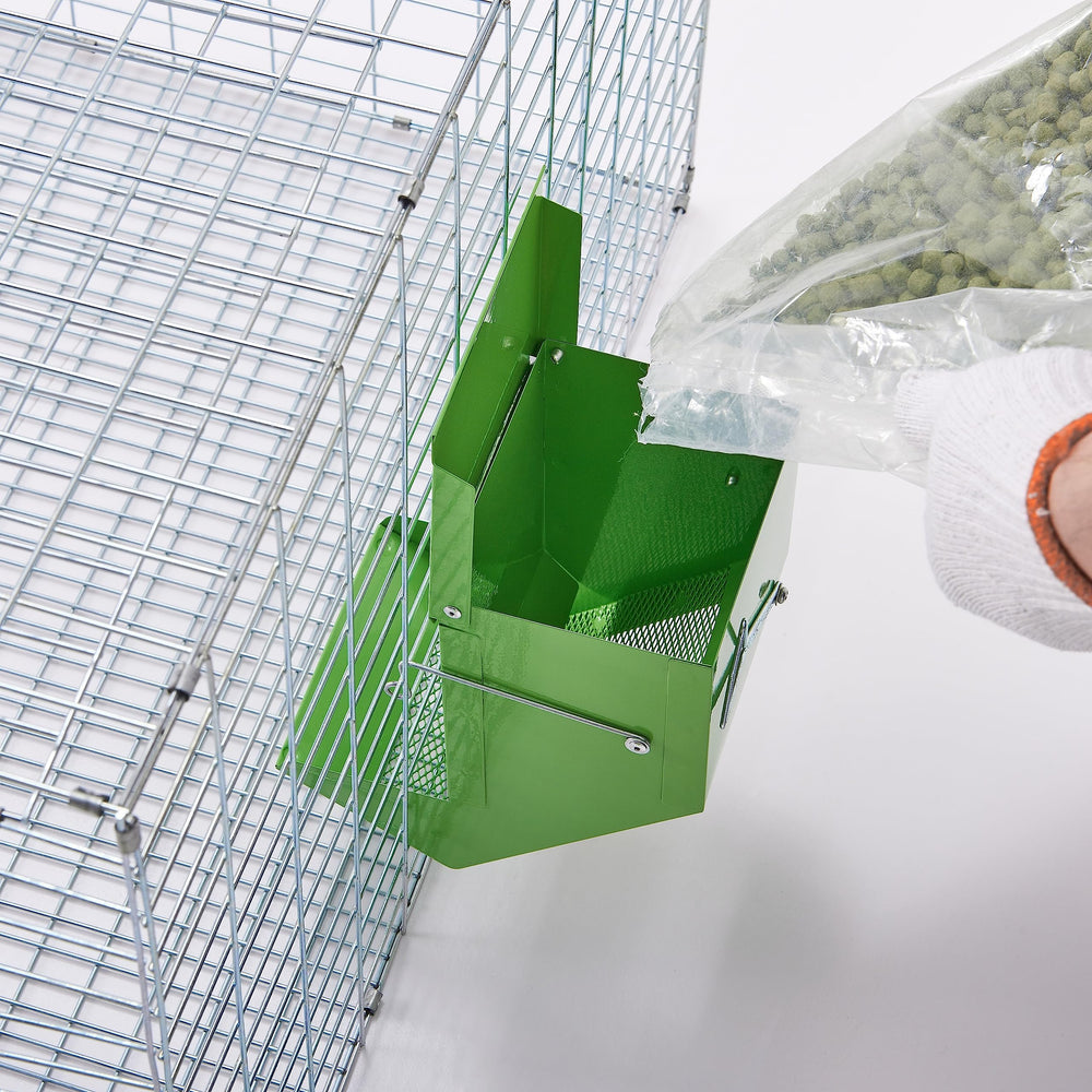 CounttyLivin green exterior keeps pellets dry in humid environments.