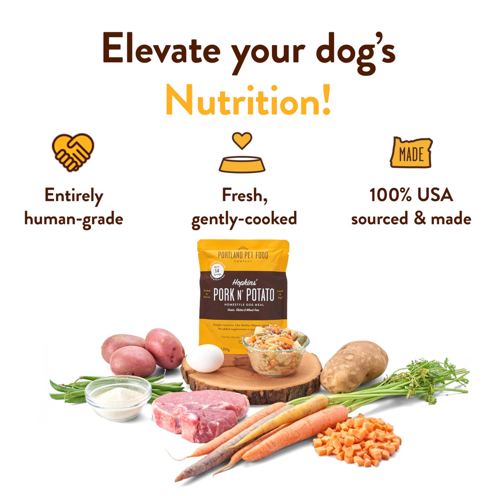 CRAFTED BY HUMANS LOVED BY DOGS Hopkin's Pork N’ Potato pouch close-up meat texture showing lean pork.