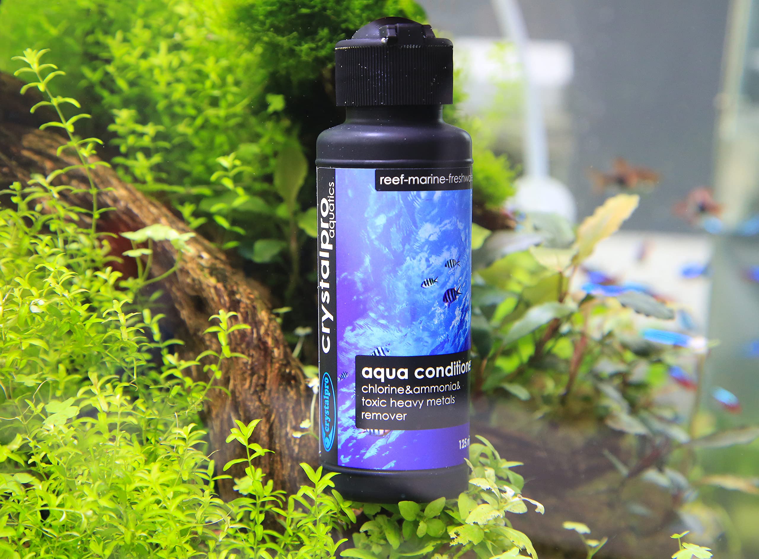 Crystalpro Aqua Conditioner packaging emphasizing mess-free dosing with cap.
