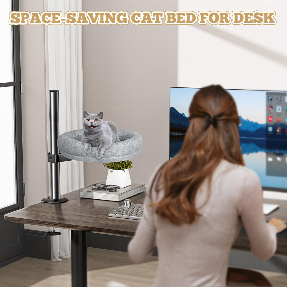 Cuipingoo cat bed keeps your cat beside you without desk disturbances.