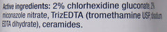 Cat face close up with Dechra MiconaHex + Triz Shampoo for skin care.