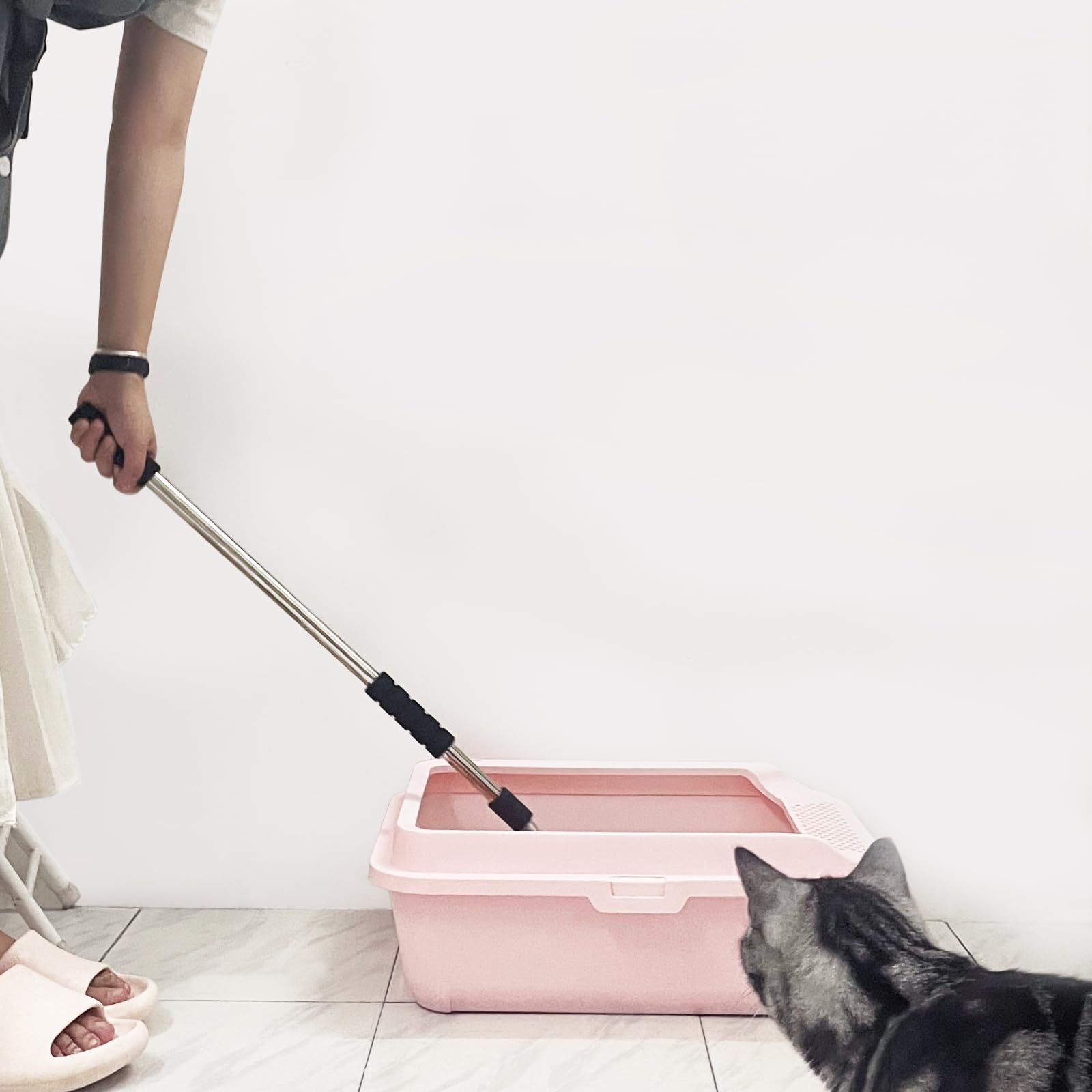 Depets pala para arena de gato con mango ajustable para mayor comodidad.