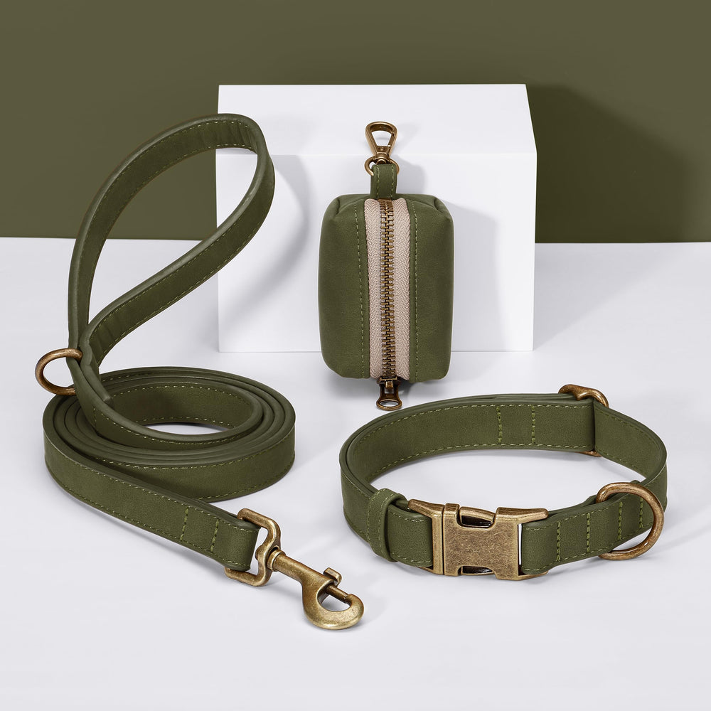 Didog dark-green collar being wiped clean—maintenance-friendly for active pets.