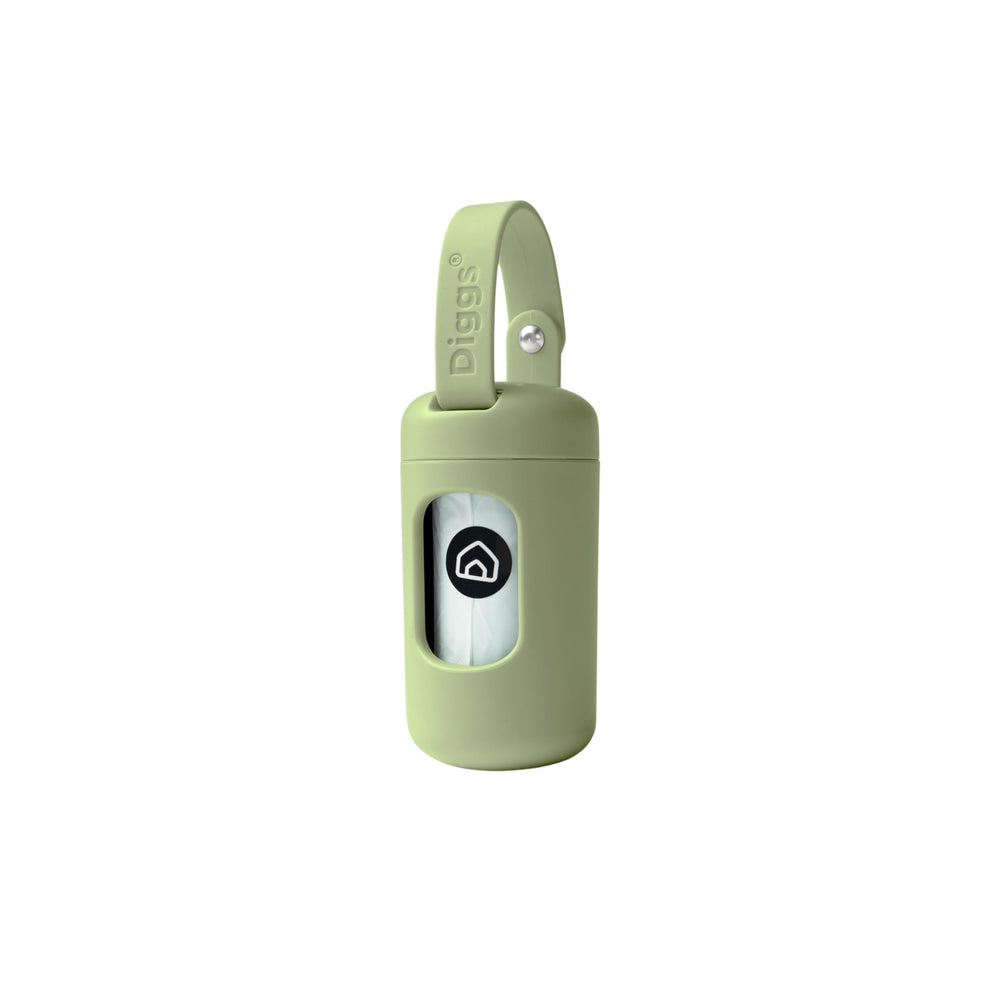 Diggs poop bag dispenser in sage attached to leash for quick one-hand cleanup.