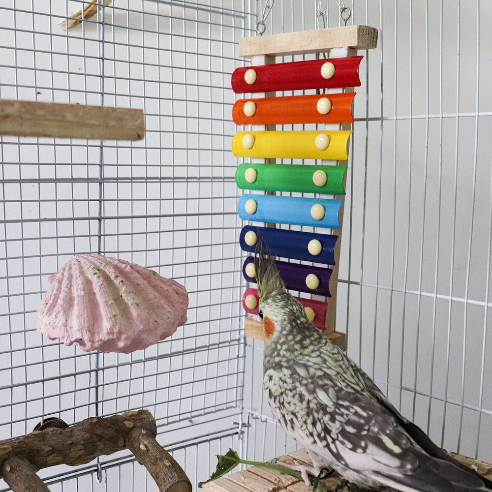 Dnoifne natural wood and metal pieces produce varied sounds during playtime.
