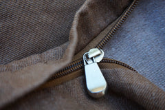Dogbed4less brown denim cover zipper detail shows secure closure for longevity.