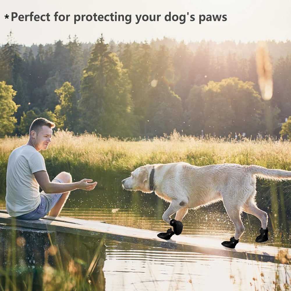 DOGOYS waterproof paw boots in black guard against wet conditions and debris.