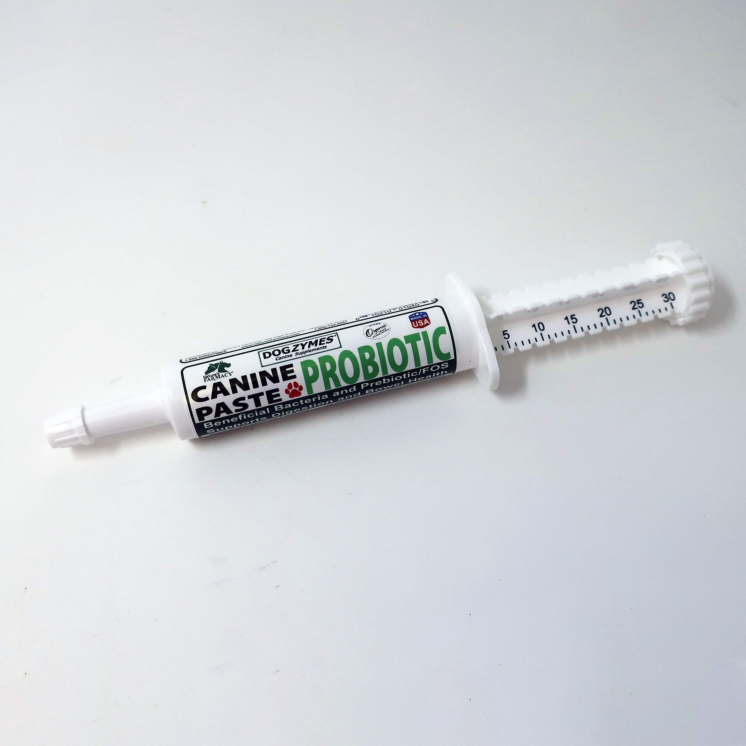 Dogzymes canine probiotic paste texture close-up shows smooth, ready-to-use consistency.