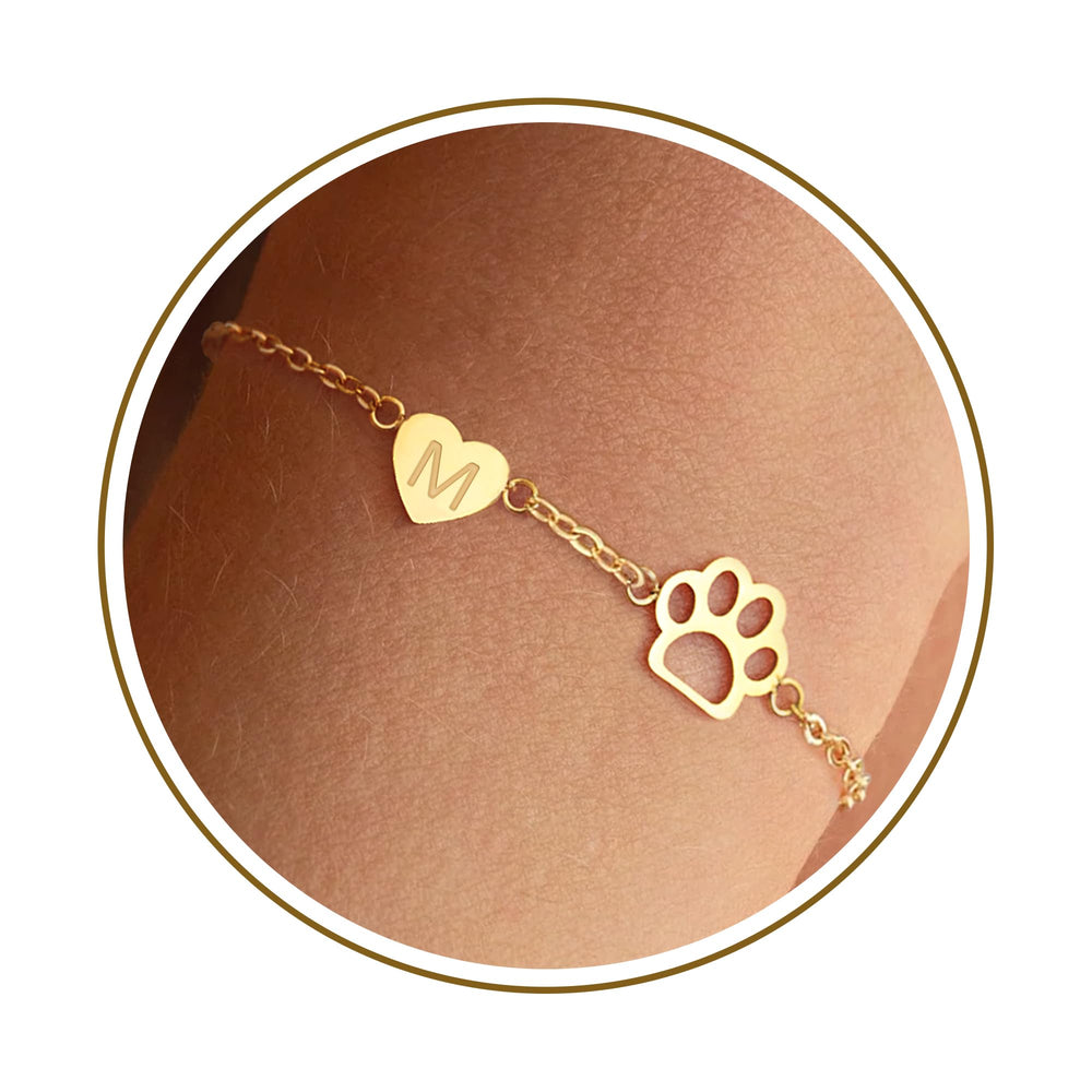 DONYUDE dog paw initial bracelet closeup showing dainty design for pet lovers.