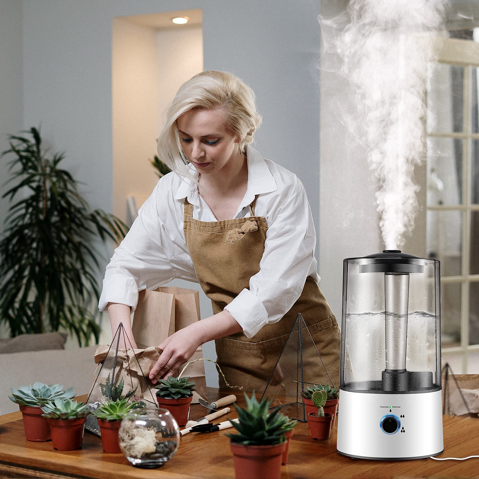 Dreyoo humidifier demonstrates adjustable hose length for versatile placement.