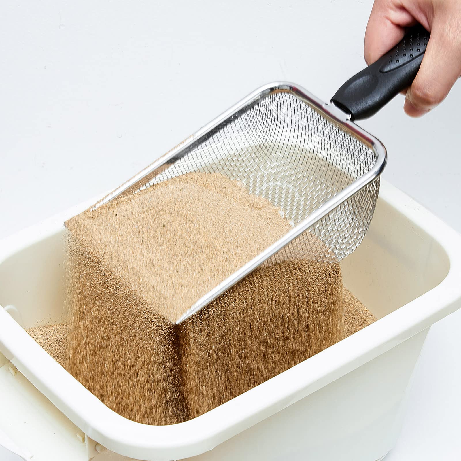 Dunzy litter-cleaning potential for small pets demonstrated with sifter