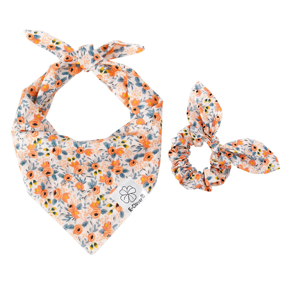 E-Clover scrunchie worn as wrist accessory, coordinating with the bandana