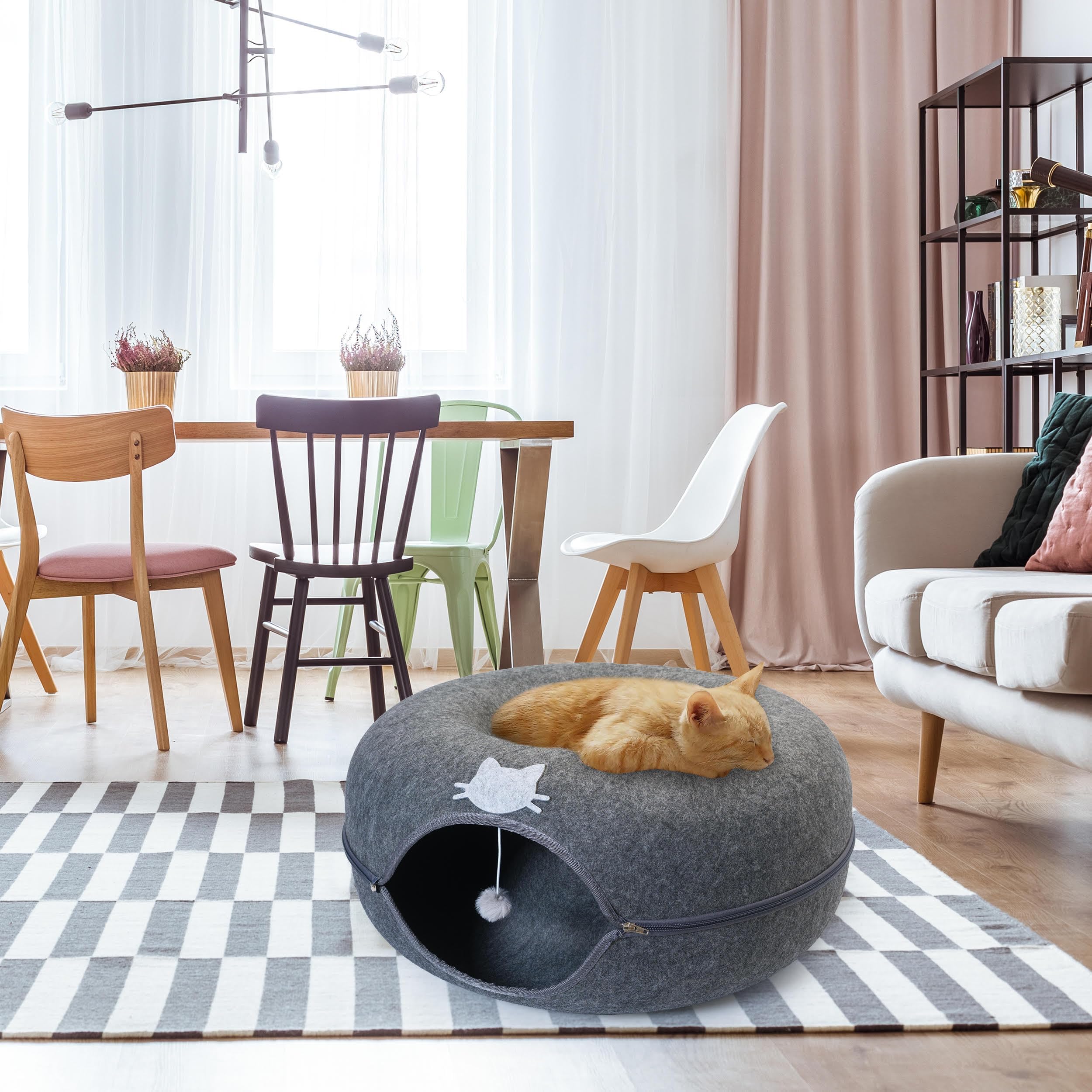 E & E's Meow Mansion dual-function bed and tunnel for cozy sleep and active play.