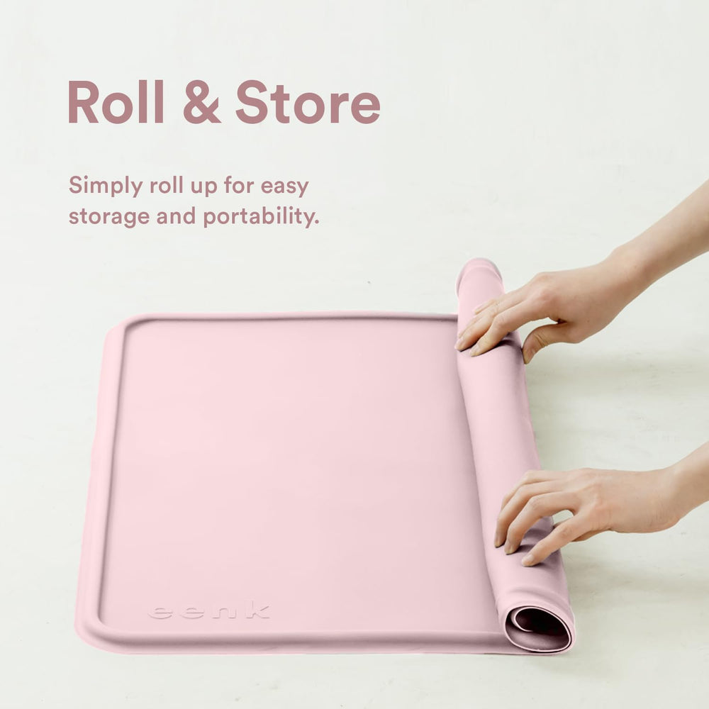 eenk pee pad tray holder with dog food bowl nearby suggests versatile setup