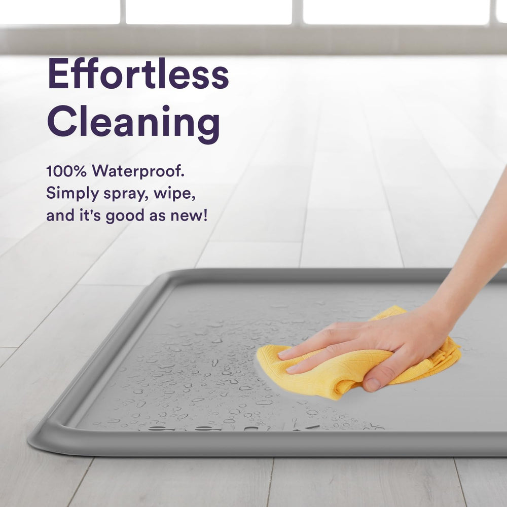 eenk pee pad tray holder non-slip bottom keeps it steady on slick floors