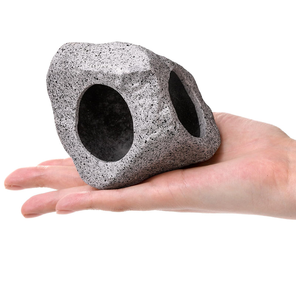Eorbow rock caves large design provides natural shelter and focal point.