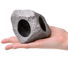 Eorbow rock caves large design provides natural shelter and focal point.