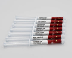 Close-up of dosing vial for safe application and proper livestock treatment